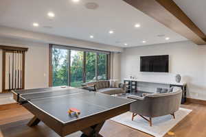 Playroom featuring hardwood / wood-style floors and recessed lighting