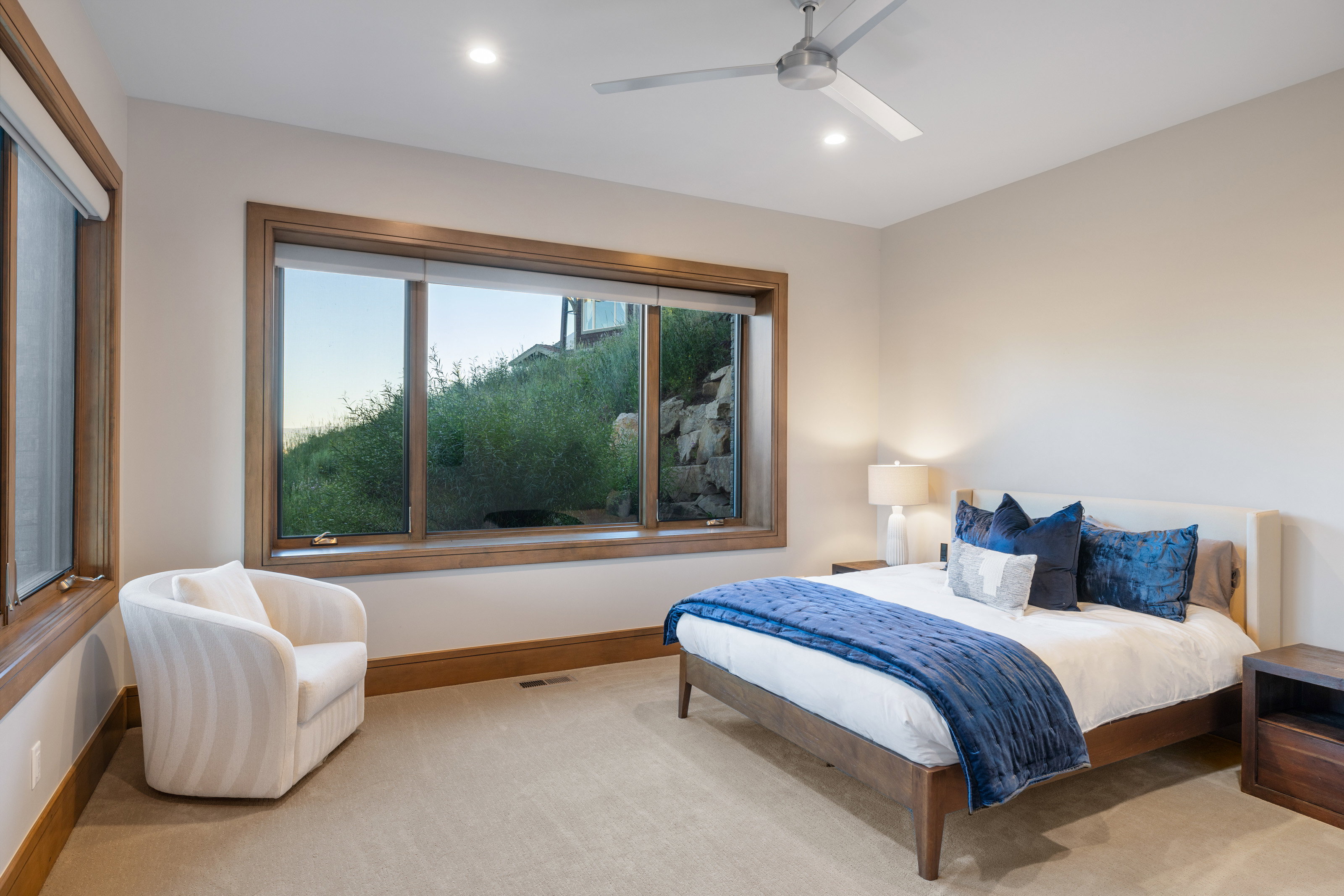 Bedroom featuring carpet flooring, a ceiling fan, and recessed lighting
