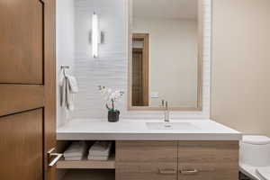 Bathroom with vanity and toilet