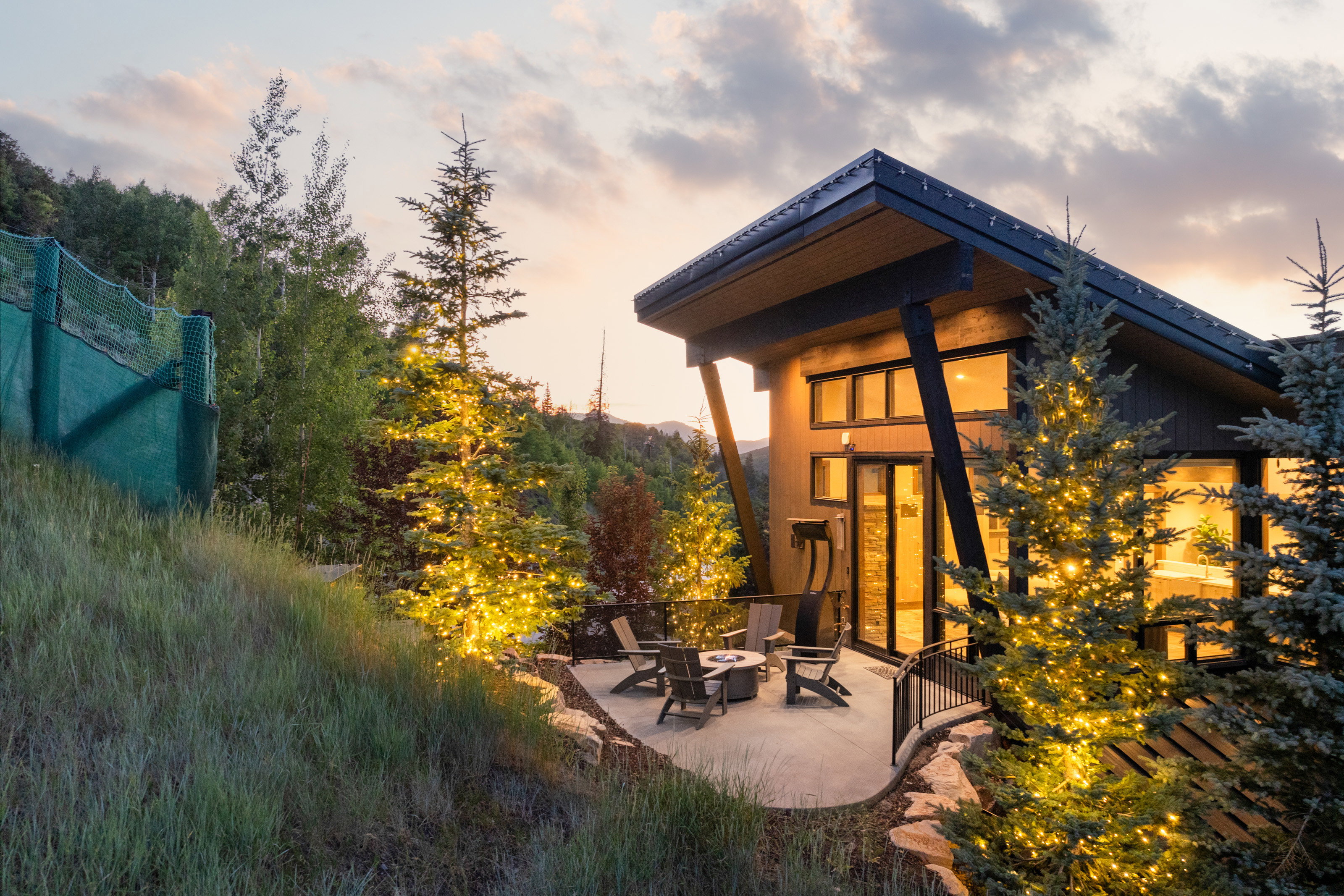 Patio terrace at dusk with a fire pit