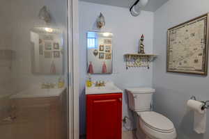 Bathroom with vanity and toilet