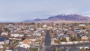 Aerial view of residential area with a mountainous background