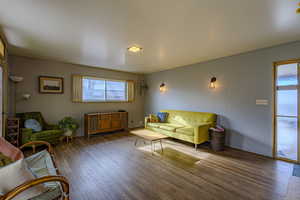 Living area featuring hardwood / wood-style floors