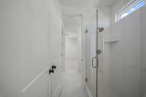 Bathroom with a shower stall