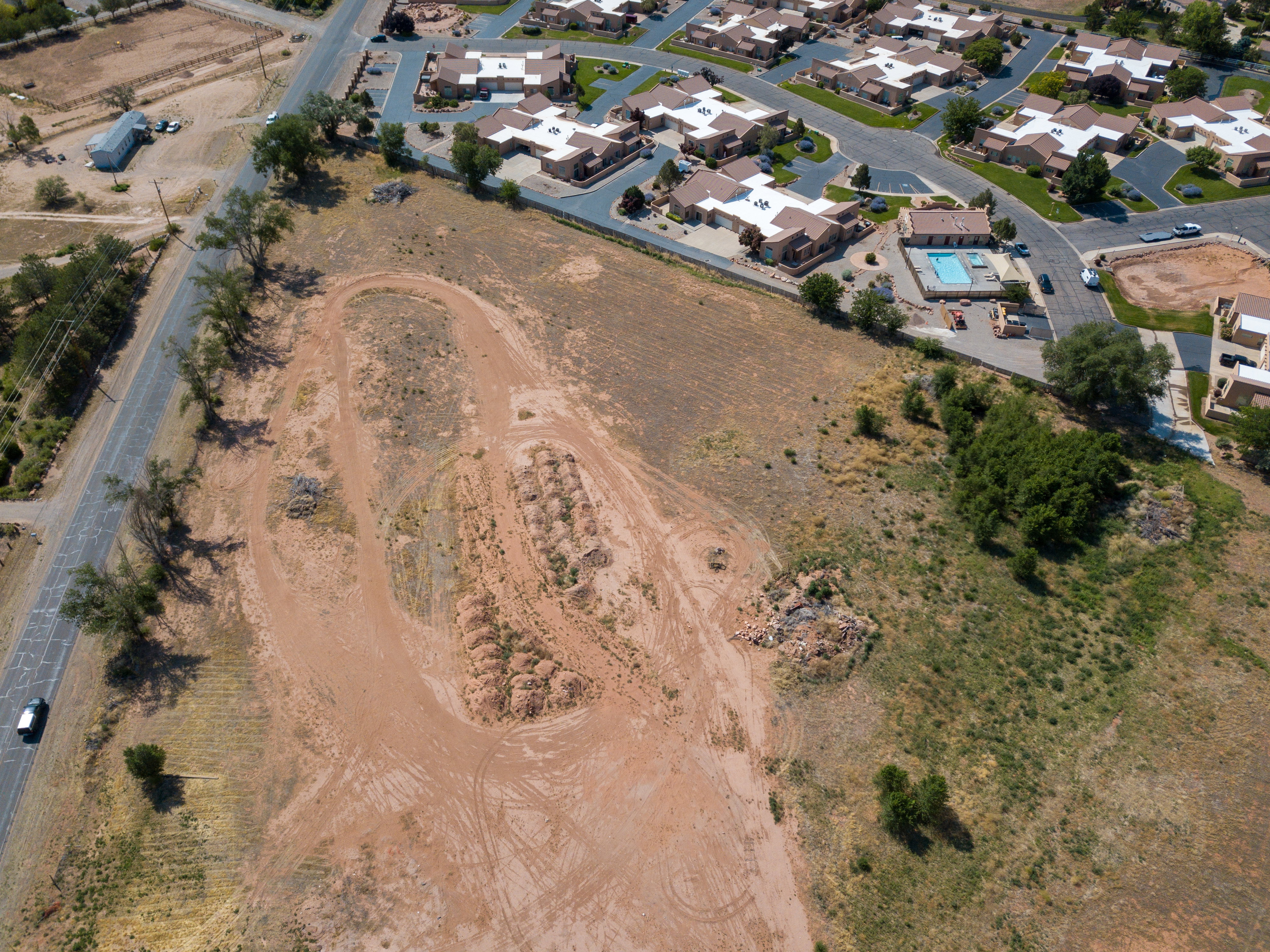 View of property location featuring nearby suburban area