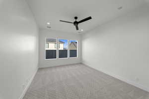 Unfurnished room with carpet, recessed lighting, and a ceiling fan