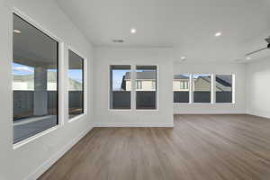 Spare room with light wood-style flooring, recessed lighting, and ceiling fan