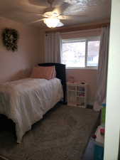 Bedroom with a ceiling fan