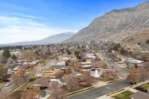 Aerial view of residential area with mountains