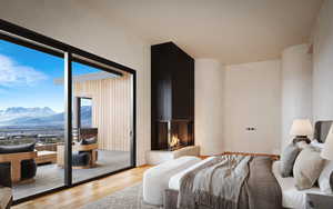 Bedroom with hardwood / wood-style floors, access to outside, and a mountain view