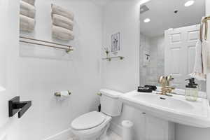 Bathroom with toilet and recessed lighting