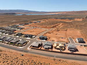 Aerial view of property's location with nearby suburban area and a water and mountain view