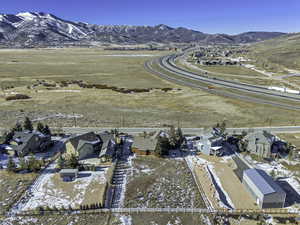 Aerial view of residential area with a mountainous background