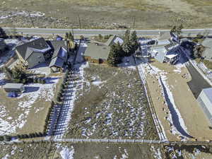 Snowy aerial view with a residential view