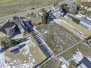 Snowy aerial view with a residential view