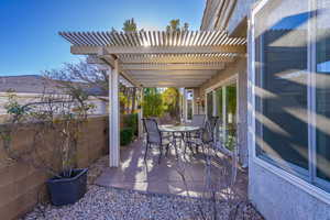 View of patio / terrace with outdoor dining space and a pergola