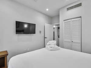 Bedroom featuring a closet and recessed lighting