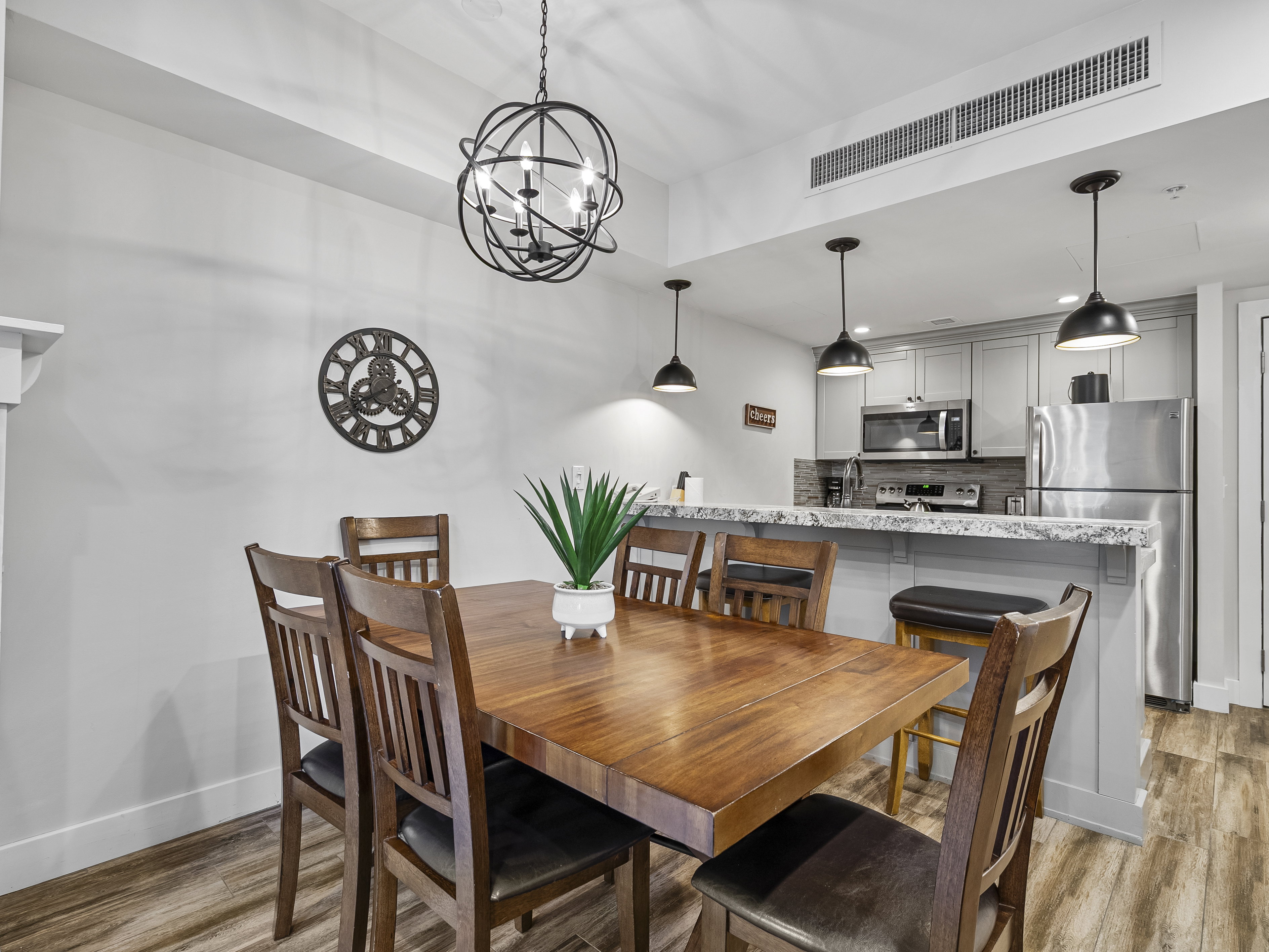 Dining room with a chandelier and light wood-style floors