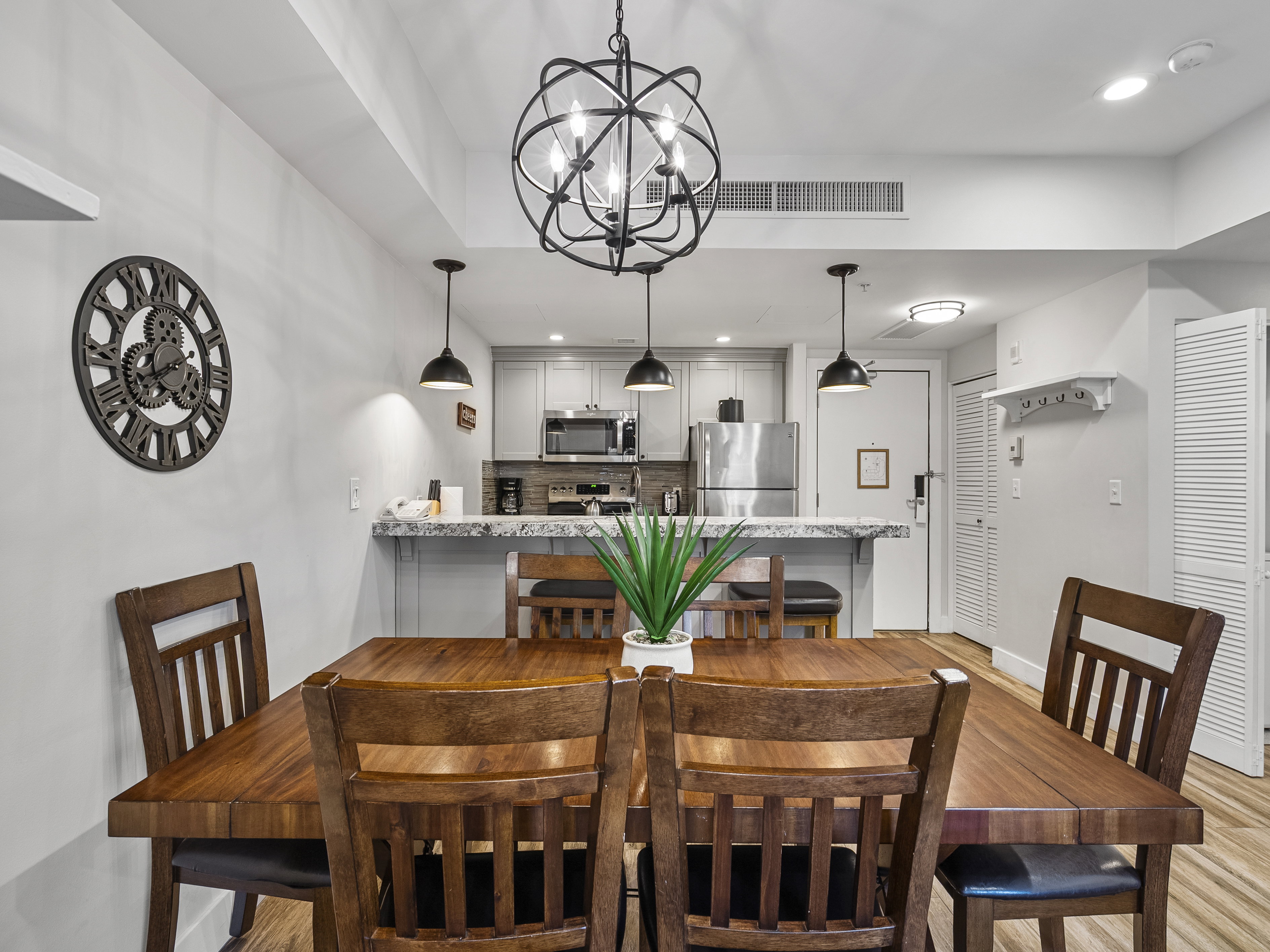 Dining area featuring a chandelier, recessed lighting, and light wood-type flooring