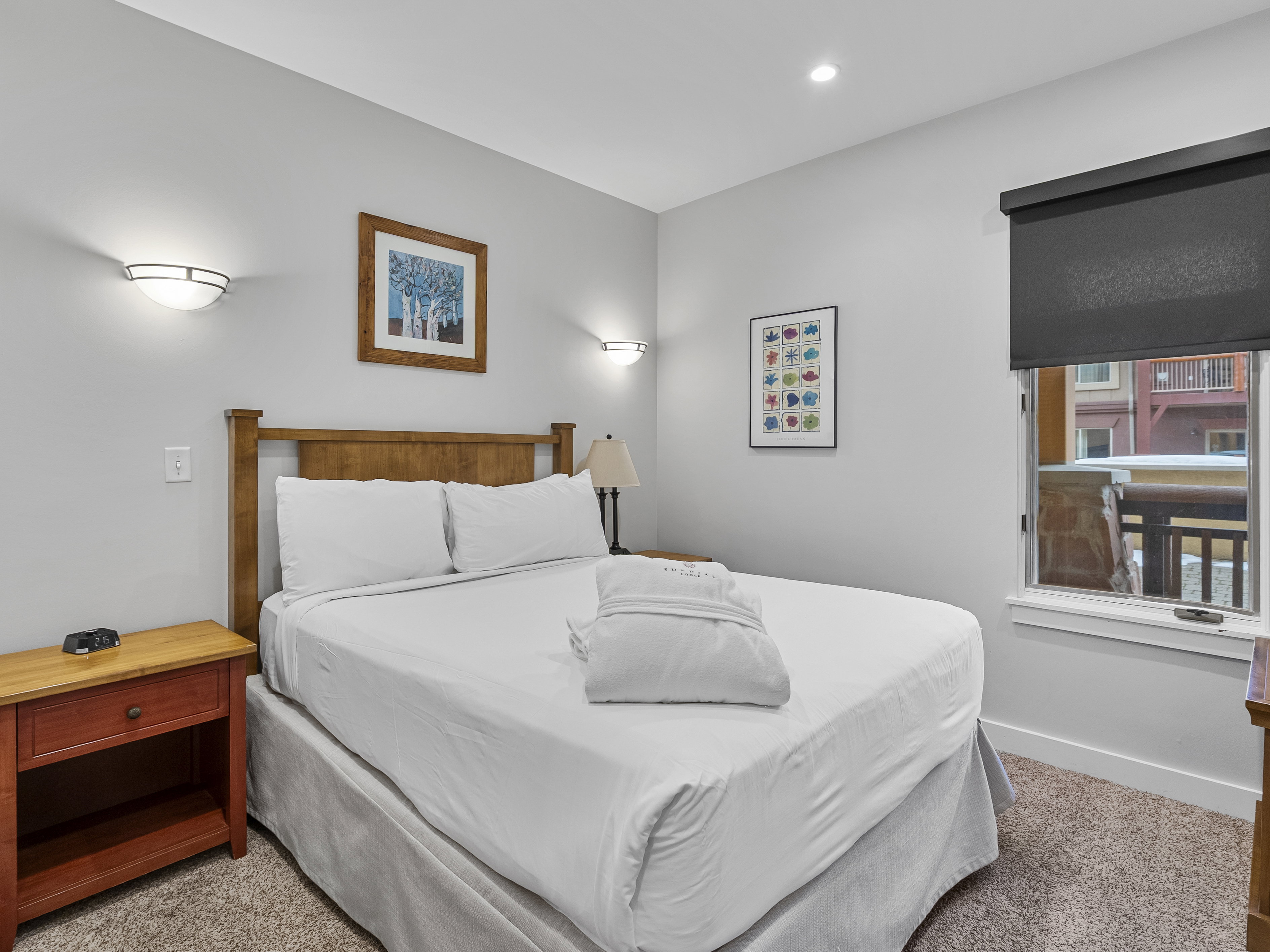 Carpeted bedroom with baseboards