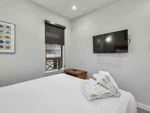 Bedroom with recessed lighting