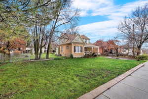 View of property exterior with a chimney