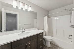 Full bathroom featuring vanity and shower / tub combo