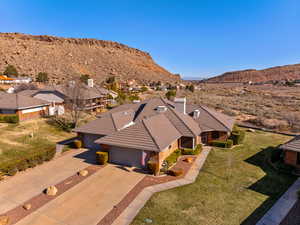 Aerial view of residential area with a mountainous background