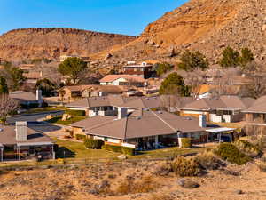 Aerial view of residential area featuring mountains