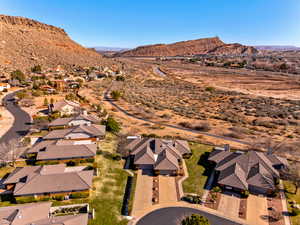 Aerial view of residential area featuring a mountain backdrop