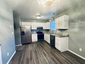 Updated Kitchen with Granite Counter tops & New Stainless Appliances