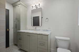 Bathroom with toilet and vanity