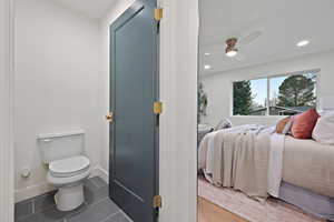 Bathroom with recessed lighting, ceiling fan, and tile patterned floors
