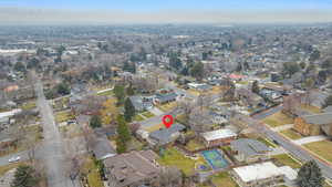 Aerial overview of property's location with nearby suburban area