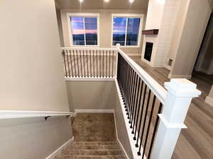 Stairway featuring baseboards