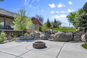 Patio / terrace featuring an outdoor fire pit and a patio