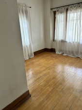 Spare room with light wood-style flooring