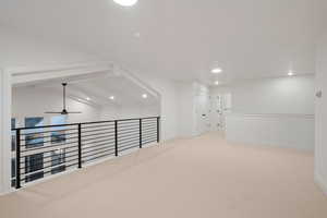 Unfurnished room featuring recessed lighting, light colored carpet, and a ceiling fan