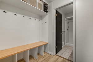 Mudroom featuring light wood-type flooring