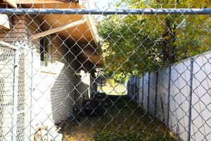 View of fenced back yard