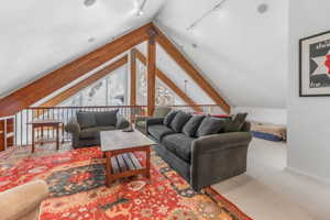 Loft living room with vaulted ceiling