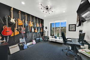Office featuring a chandelier and recessed lighting