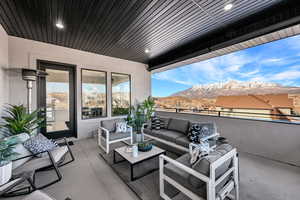 View of patio / terrace with a mountain view and outdoor lounge area