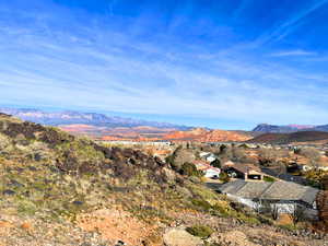 View of mountain background featuring nearby suburban area