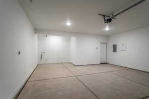 Garage featuring electric panel