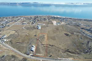 View of property location with a large body of water and property parcel outlined