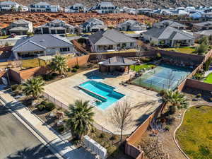 Aerial perspective of suburban area featuring a pool area