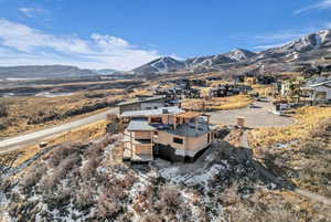 View from above of property featuring a mountain backdrop