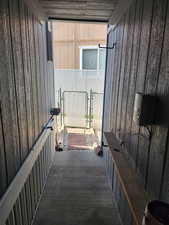 View of patio featuring a gate