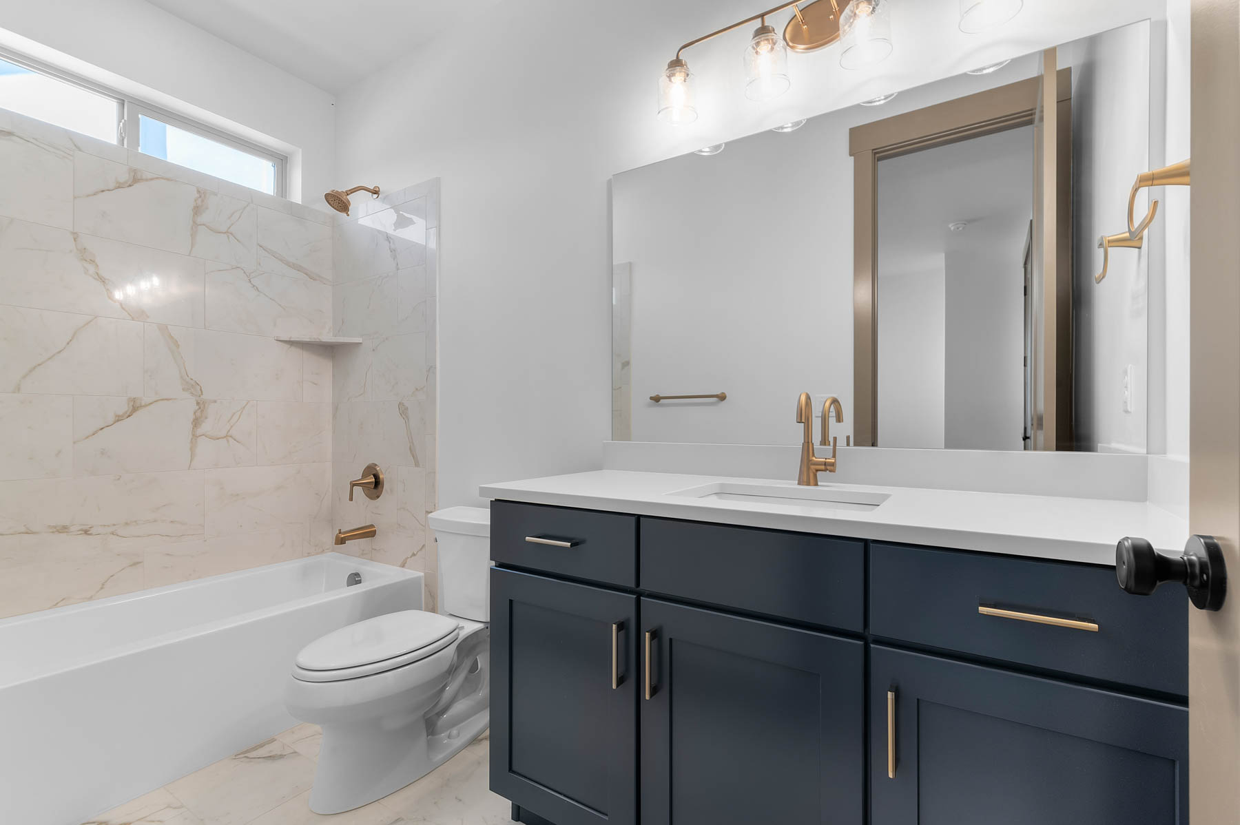 Bathroom with shower / bathtub combination and vanity